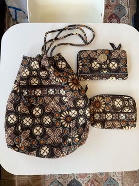 Vera Bradley Quilted Brown Floral Drawstring Backpack with Matching Wallets